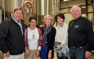 Foundation president Ruth Winett chats with attendees at Jack's Abby Brewing.