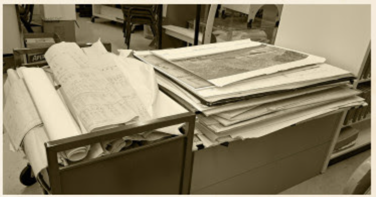 ancient maps Many ancient maps from the FPL's collection piled up on boxes